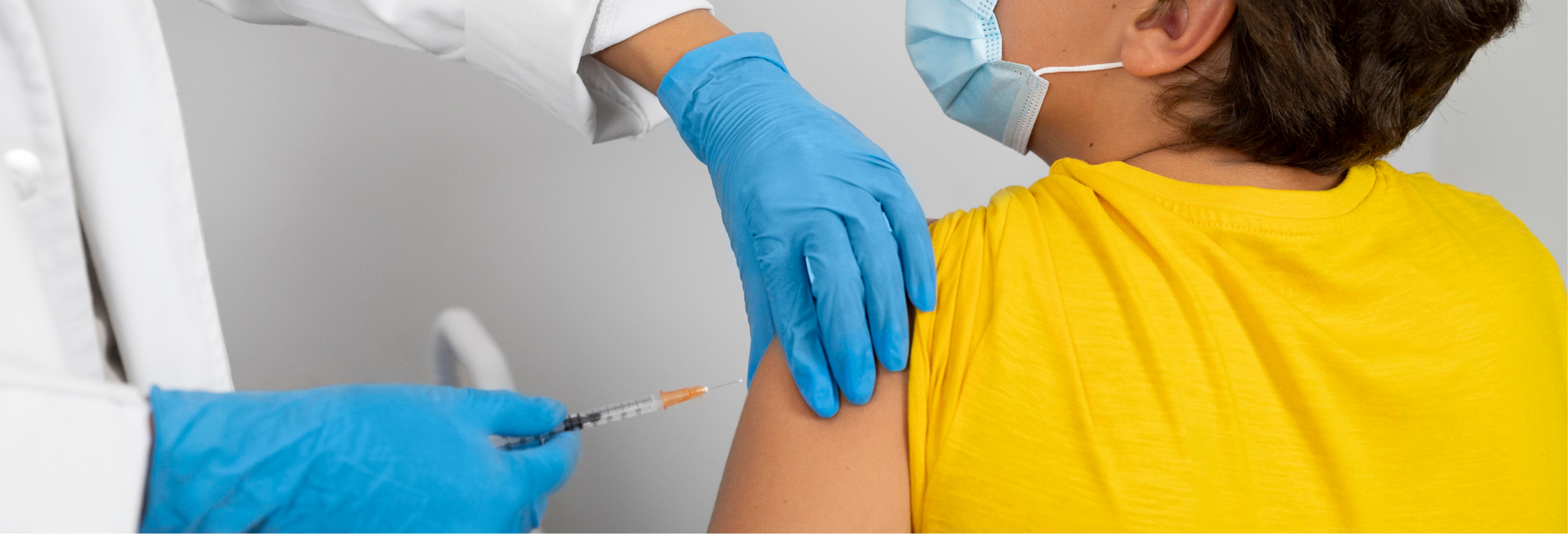 Child receiving a vaccination at House of Health Birmingham
